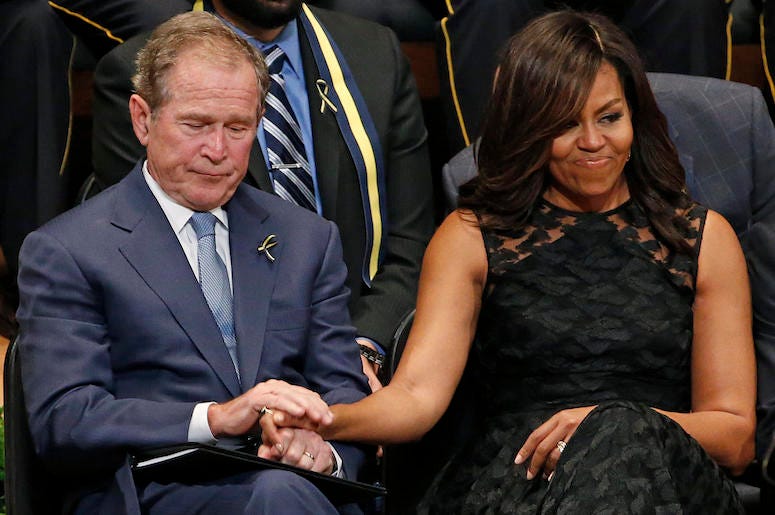 Michelle Obama, George W Bush, Holding Hands, Dallas, Meyerson Symphony Center, Memorial, 2016 Michelle Obama, George W Bush, Holding Hands, Dallas, Meyerson Symphony Center, Memorial, 2016