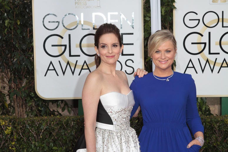 Actress and Co-Host Tina Fey and Amy Poehler arrive at the 72nd Annual Golden Globe Awards Actress and Co-Host Tina Fey and Amy Poehler arrive at the 72nd Annual Golden Globe Awards