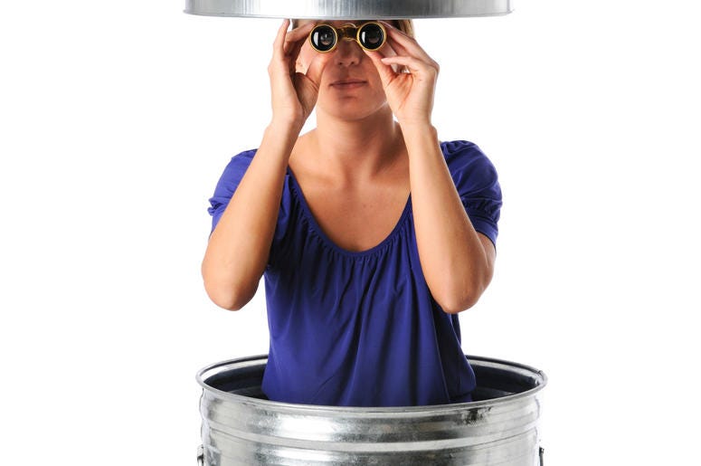 Woman in trash can