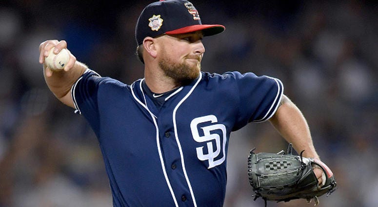 JULY 05: Kirby Yates #39 of the San Diego Padres pitches in relief against the Los Angeles Dodgers during the ninth inning at Dodger Stadium on July 05, 2019 in Los Angeles, California. (Photo by Harry How/Getty Images)