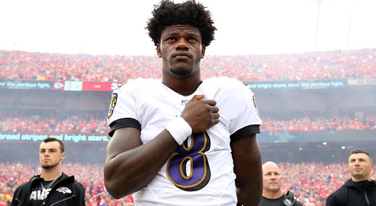 EPTEMBER 22: Quarterback Lamar Jackson #8 of the Baltimore Ravens stands during the national anthem before their game against the Kansas City Chiefs at Arrowhead Stadium on September 22, 2019 in Kansas City, Missouri. (Photo by Jamie Squire/Getty Images)