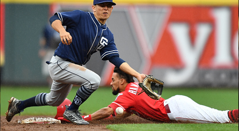 CINCINNATI, OH - SEPTEMBER 9: Luis Urias #9 of the San Diego Padres bobbles the throw as Billy Hamilton #6 of the Cincinnati Reds steals second base in the sixth inning at Great American Ball Park on September 9, 2018 in Cincinnati, Ohio. (Photo by Jamie