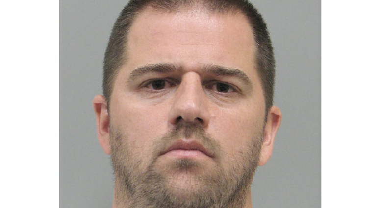 Mug shot of Metro Officer Daniel Kelly