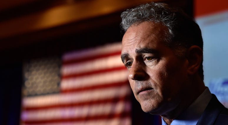 Republican candidate for Nevada's 3rd House District Danny Tarkanian speaks with the media after conceding his race against Democrat Susie Lee