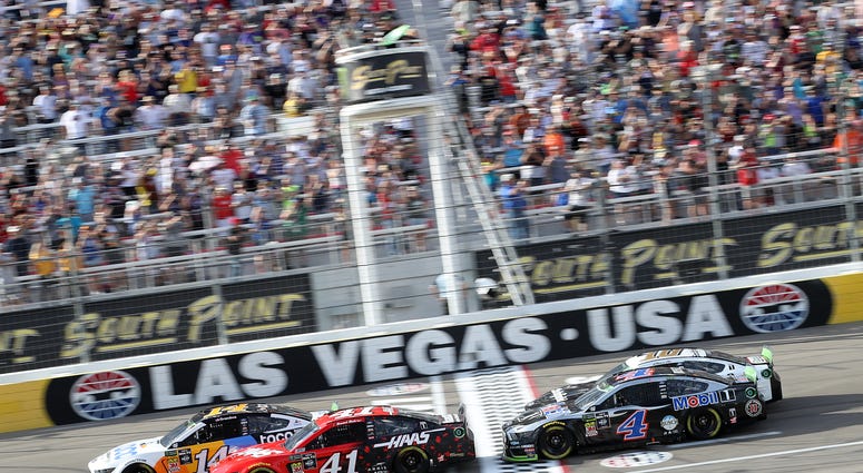 Daniel Suarez, driver of the #41 Haas Automation Ford, and Clint Bowyer, driver of the #14 Toco Warranty Ford, lead the field at the start of the Monster Energy NASCAR Cup Series South Point 400 at Las Vegas Motor Speedway on September 15, 2019