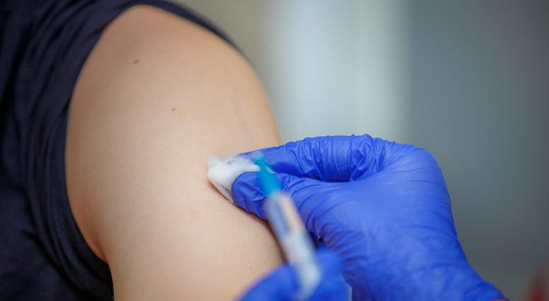 Flu vaccine being administered