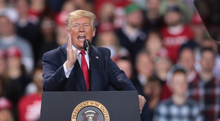 President Donald Trump addresses his impeachment during a Merry Christmas Rally at the Kellogg Arena on December 18, 2019 in Battle Creek, Michigan.