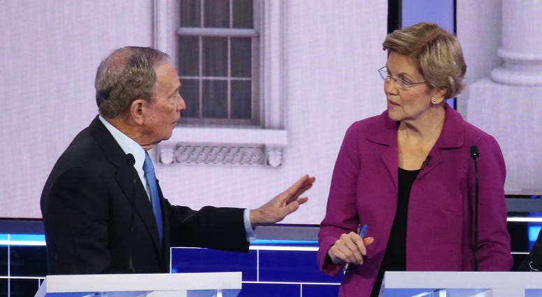 Democratic presidential candidates former New York City Mayor Mike Bloomberg and Sen. Elizabeth Warren (D-MA) speak during the Democratic presidential primary debate at Paris Las Vegas on February 19, 2020 in Las Vegas,
