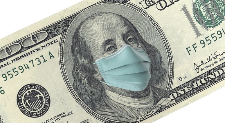 American One Hundred Dollar Bill with surgical mask. Protection from Coronavirus on economy.