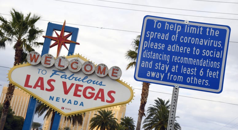 Welcome To Las Vegas Sign with social distancing rules