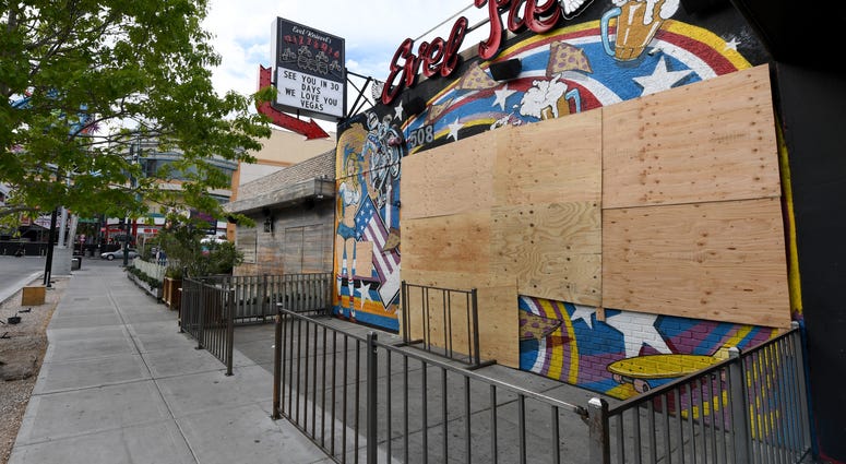 The closed Evel Pie restaurant in the Fremont East Entertainment District is boarded up as a result of the statewide shutdown due to the continuing spread of the coronavirus across the United States on March 22, 2020