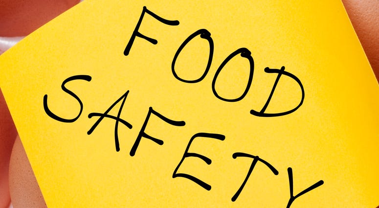 Eggs Can Carry Salmonella Food Safety Concept Concept with Brown Egg and Yellow Note.