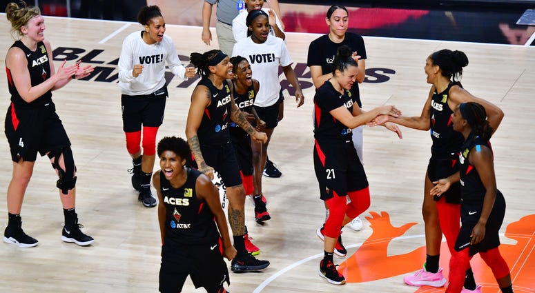 The Las Vegas Aces celebrate their series victory on=ver the Connecticut Sun on 9-29-20