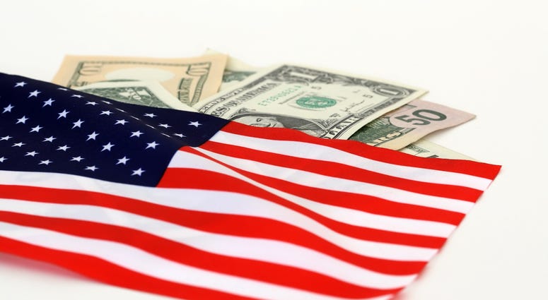 The US flag on dollar bills