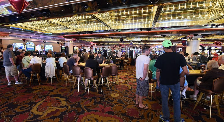 Guests gamble on the casino floor at the Riviera Hotel & Casino on April 30, 2015 in Las Vegas, Nevada.