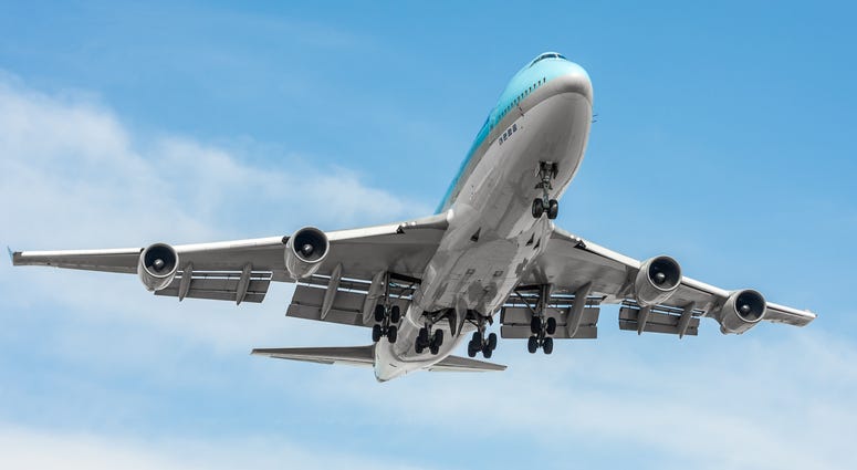Commercial airliner Boeing B747 Jumbo approaching the airport.