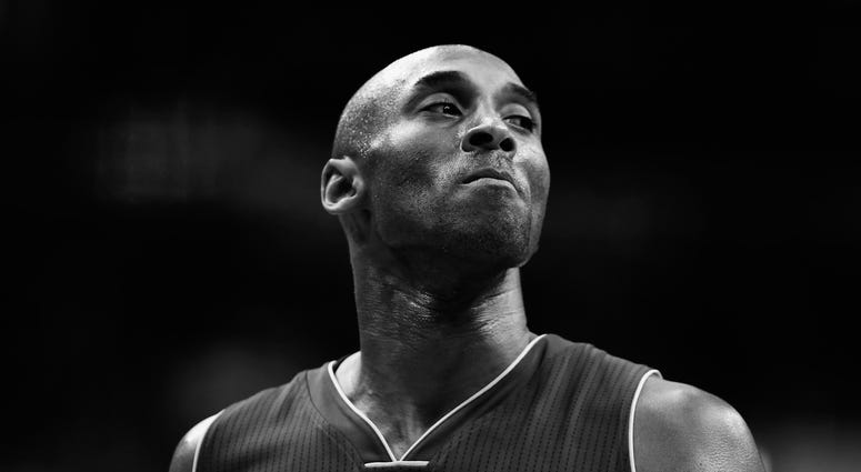 Kobe Bryant #24 of the Los Angeles Lakers looks on against the Washington Wizards in the first half at Verizon Center on December 2, 2015 in Washington