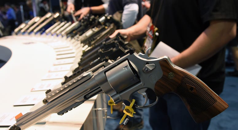 Handguns, including the model 629 .44 Magnum S&W Special (front) are displayed at the Smith & Wesson booth at the 2016 National Shooting Sports Foundation's Shooting, Hunting, Outdoor Trade (SHOT) Show at the Sands Expo and Convention Center on January 19