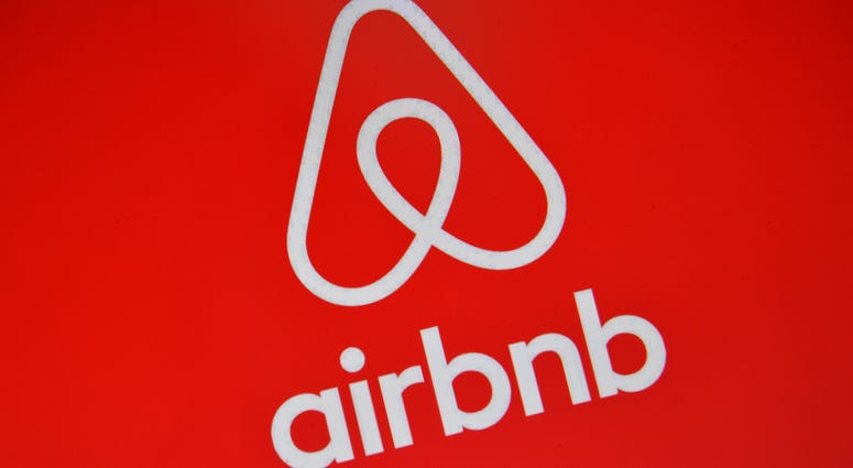 The Airbnb logo is displayed on a computer screen on August 3, 2016 in London, England.