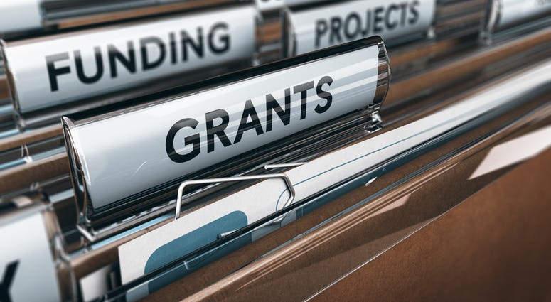 Seeking Grants for an Association, a Small Business or for Research - stock photo