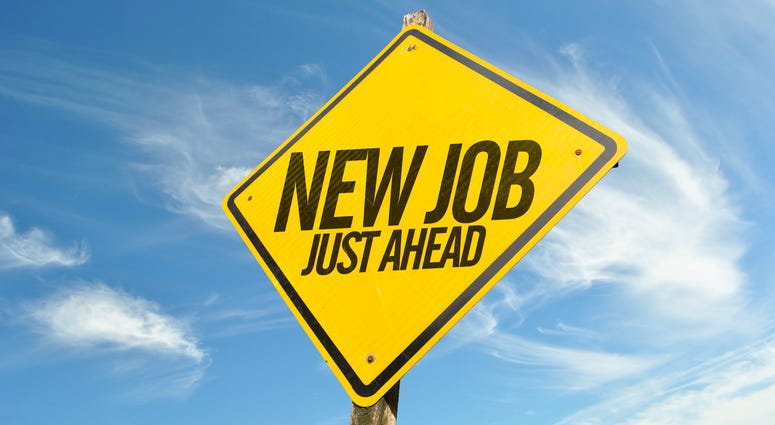 Sign advertising a job fair ahead
