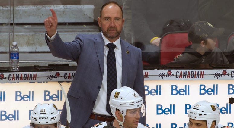 Vegas Golden Knights head coach Peter DeBoer signals to his team on the ice in the third period against the Ottawa Senators at the Canadian Tire Centre.