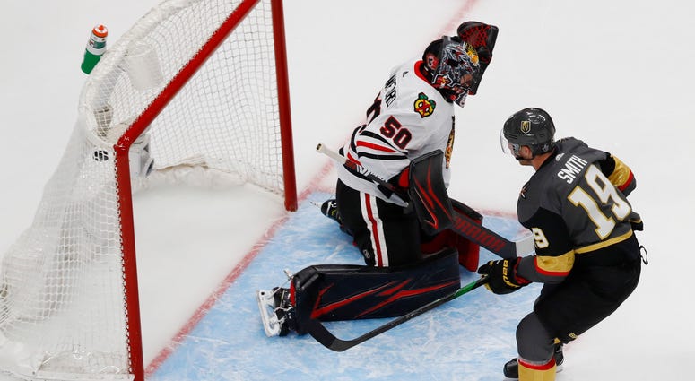 Vegas Golden Knights right wing Reilly Smith (19) scores a goal past Chicago Blackhawks goaltender Corey Crawford (50)