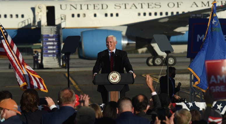 Vice President Mike Pence speaks during a campaign rally at the Reno-Tahoe International Airport in Reno on Oct. 29, 2020