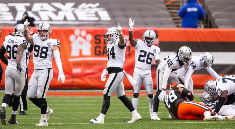The Las Vegas Raiders signal for possession following a fumble recovery against the Cleveland Browns during the first quarter at FirstEnergy Stadium.