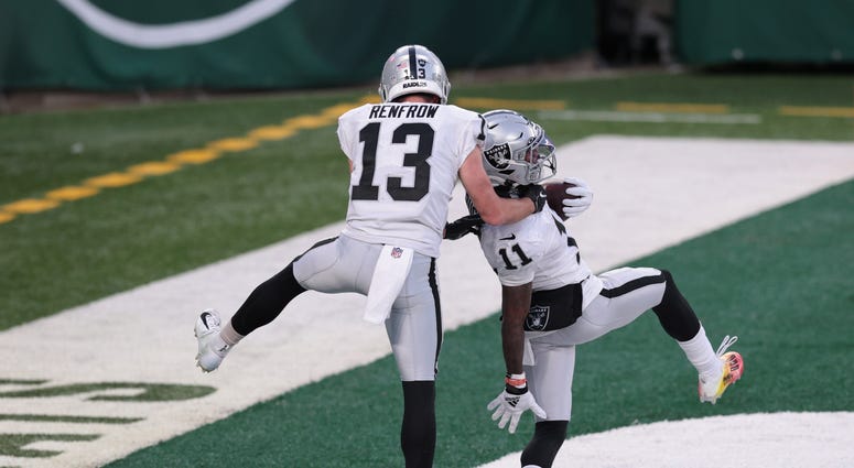 Henry Ruggs III and Hunter Renfrow celebrate a touchdown against the New York Jets on 12-6-20
