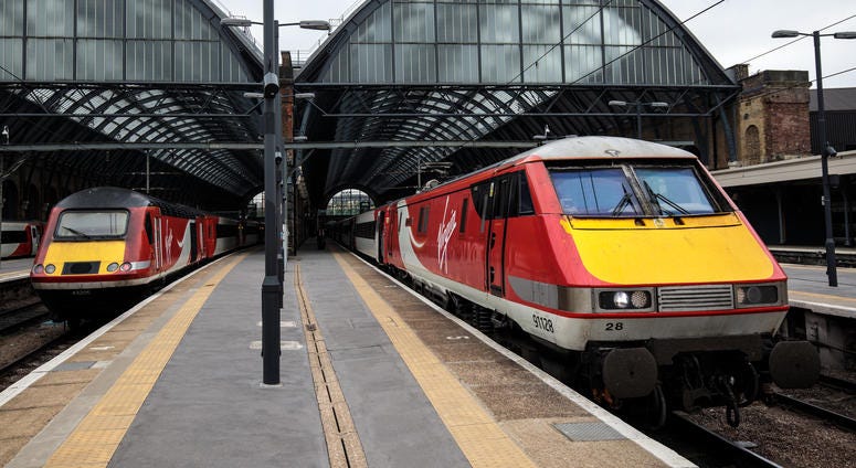 Virgin Trains East Coast trains sit at Kings Cross Station on May 16, 2018 in London, England.