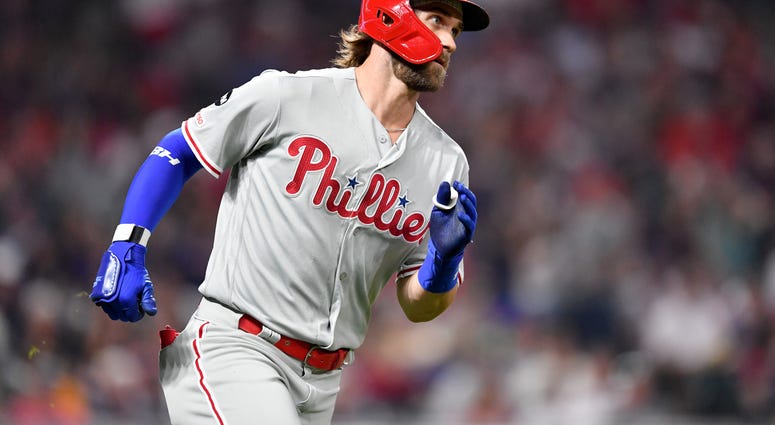 Bryce Harper #3 of the Philadelphia Phillies runs out a single to right during the sixth inning against the Cleveland Indians at Progressive Field on September 20, 2019 in Cleveland, Ohio.