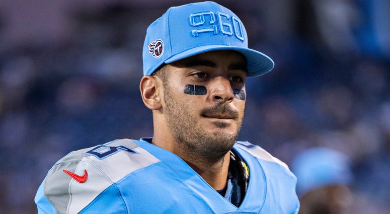 Marcus Mariota #8 of the Tennessee Titans jogs off the field after a game against the Los Angeles Chargers