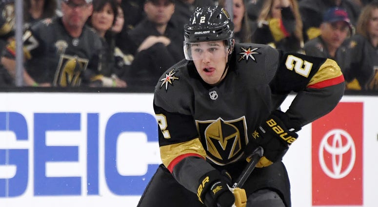 Zach Whitecloud #2 of the Vegas Golden Knights skates with the puck against the Los Angeles Kings