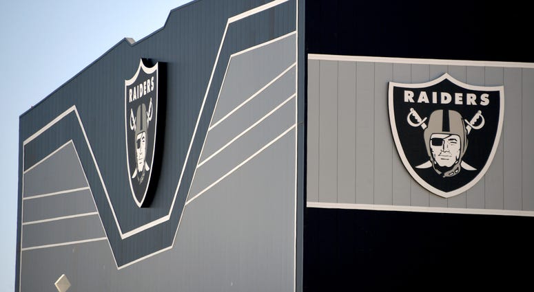 Team logos are shown on the outside of the 336,000-square-foot Las Vegas Raiders Headquarters/Intermountain Healthcare Performance Center under construction on June 10, 2020 in Henderson, Nevada