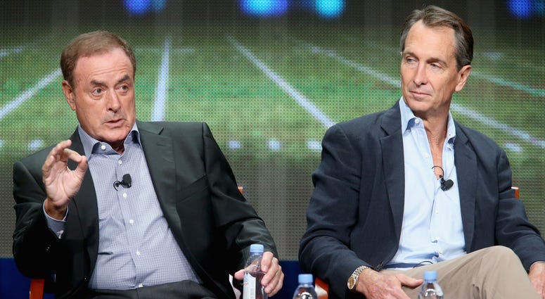 Play-by-play announcer Al Michaels and analyst Cris Collinsworth speak onstage during NBC's 'Sunday Night Football' panel discussion at the NBCUniversal portion of the 2015 Summer TCA Tour at The Beverly Hilton Hotel on August 13, 2015