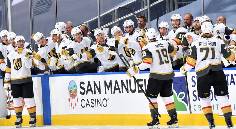 Reilly Smith gets congratulations from teammates after scoring a goal during a preseason game vs. Arizona on 7-30-20