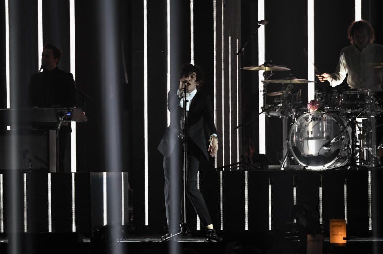 Matthew Healy performs with The 1975 on stage at The BRIT Awards 2017 Matthew Healy performs with The 1975 on stage at The BRIT Awards 2017