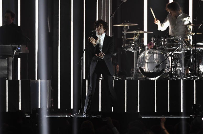 Matthew Healy performs with The 1975 on stage at The BRIT Awards 2017 Matthew Healy performs with The 1975 on stage at The BRIT Awards 2017