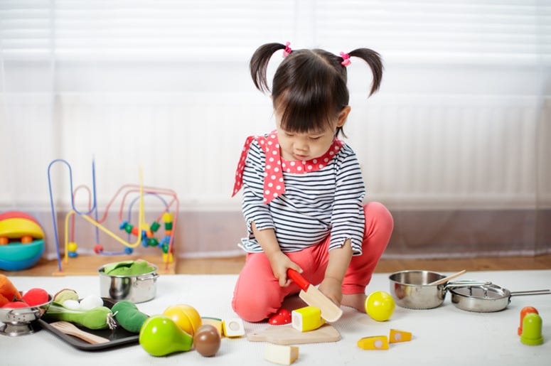 Girl Playing With Toys Girl Playing With Toys