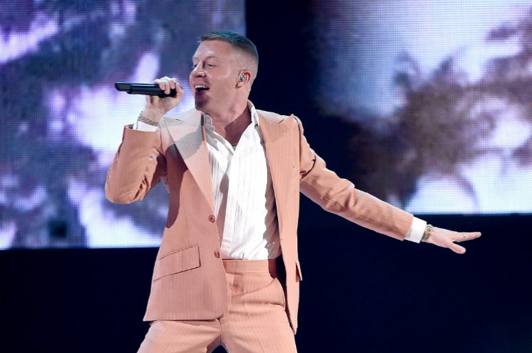 Macklemore LOS ANGELES, CA - NOVEMBER 19: Macklemore performs at the 2017 American Music Awards at Microsoft Theater on November 19, 2017 in Los Angeles, California.