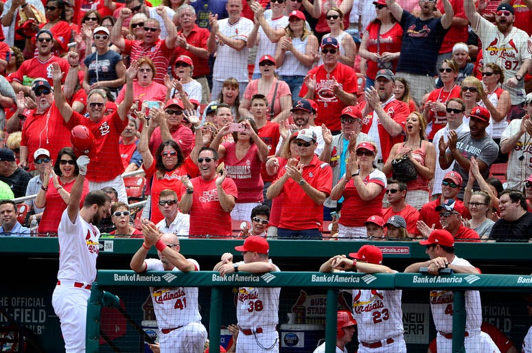St. Louis Cardinals pitcher Adam Wainwright salutes fans at Busch Stadium St. Louis Cardinals pitcher Adam Wainwright salutes fans at Busch Stadium