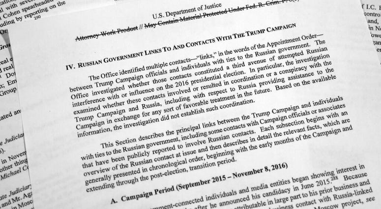 Special counsel Robert Mueller's redacted report on Russian interference in the 2016 presidential election as released on Thursday, April 18, 2019, is photographed in Washington. Mueller report