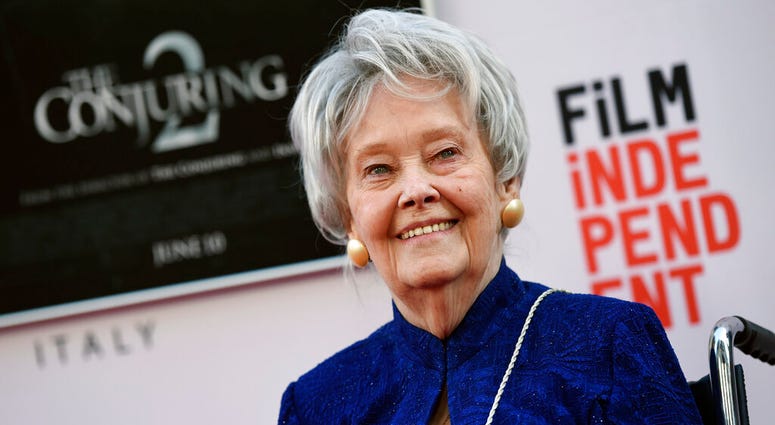 In this June 7, 2016, file photo, paranormal investigator and film consultant Lorraine Warren poses at the premiere of the film "The Conjuring 2" during the Los Angeles Film Festival at the TCL Chinese Theatre in Los Angeles. Lorraine Warren