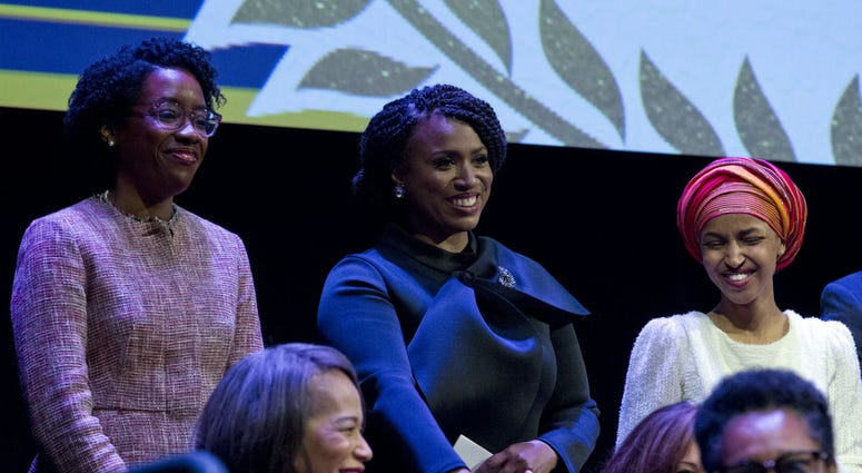 From left, Lauren Underwood D-IL, Ayanna Pressley, D-Mass., and Ilhan Omar D-MN, during the swearing-in ceremony of Congressional Black Caucus members of the 116th Congress at The Warner Theatre in Washington, Thursday, Jan. 3, 2019. From left, Lauren Underwood D-IL, Ayanna Pressley, D-Mass., and Ilhan Omar D-MN, during the swearing-in ceremony of Congressional Black Caucus members of the 116th Congress at The Warner Theatre in Washington, Thursday, Jan. 3, 2019.