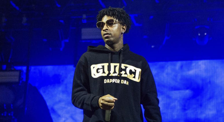 In this Sunday, Oct. 28, 2018, file photo, 21 Savage performs at the Voodoo Music Experience in City Park in New Orleans. Authorities In this Sunday, Oct. 28, 2018, file photo, 21 Savage performs at the Voodoo Music Experience in City Park in New Orleans. Authorities