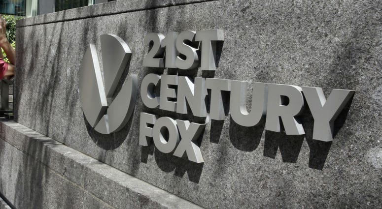 This Aug. 1, 2017, file photo shows the 21st Century Fox sign outside of the News Corporation headquarters building in New York. This Aug. 1, 2017, file photo shows the 21st Century Fox sign outside of the News Corporation headquarters building in New York.