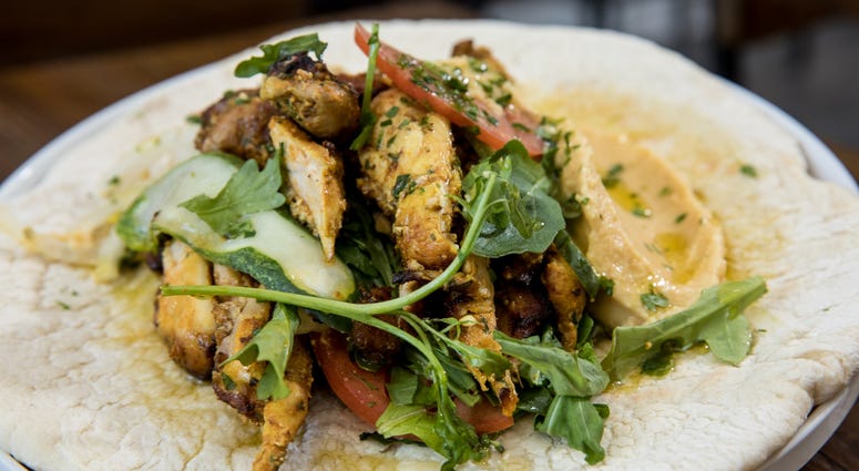 Chicken shawarma with hummus at Stina. Stina restaurant