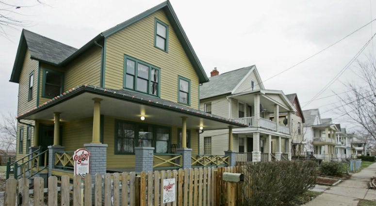 This file photo shows the house, left, where the 1983 movie "A Christmas Story" was filmed in Tremont neighborhood of Cleveland. A Christmas Story House