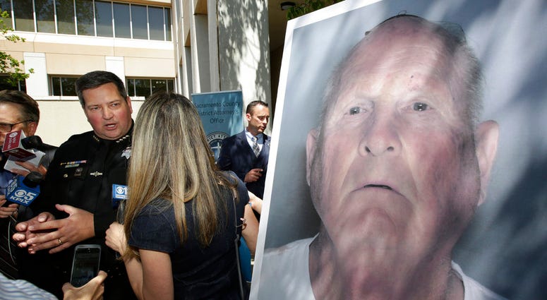 Sacramento County Sheriff Scott Jones, left, talks to reporters about the arrest Joesph James DeAngelo, seen in photo, on suspicion of committing a string of violent crimes in the 1970's and 1980's after a news conference. Sacramento County Sheriff Scott Jones, left, talks to reporters about the arrest Joesph James DeAngelo, seen in photo, on suspicion of committing a string of violent crimes in the 1970's and 1980's after a news conference.